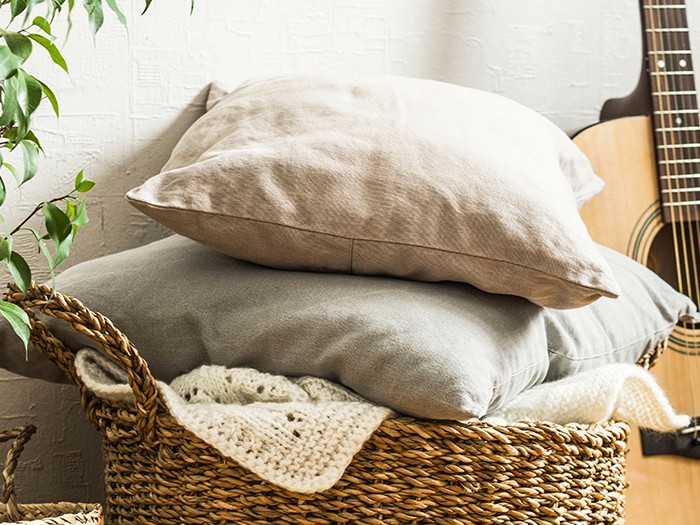 basket of throw pillows