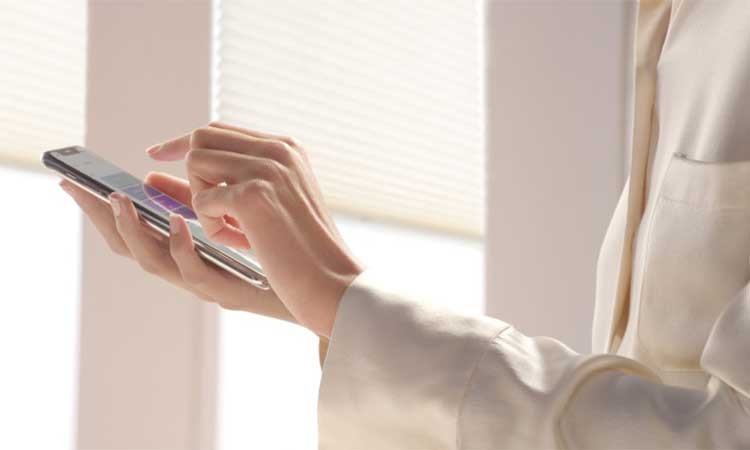 Woman holding a smart phone